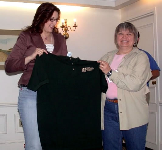 Pauwlina Dexter of UNB's Population Ecology Group was awarded first prize for the best student paper by newly elected AES President, Kenna MacKenzie.  Photo by George Fanjoy.