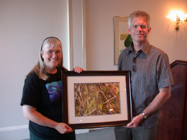 Donna Giberson received a beautiful framed photograph of a green darner dragonfly from outgoing AES President Jon Sweeney, in appreciation of her excellent work organizing the 2004 Joint Annual Meeting of the ESC and AES.  Photo by George Fanjoy.